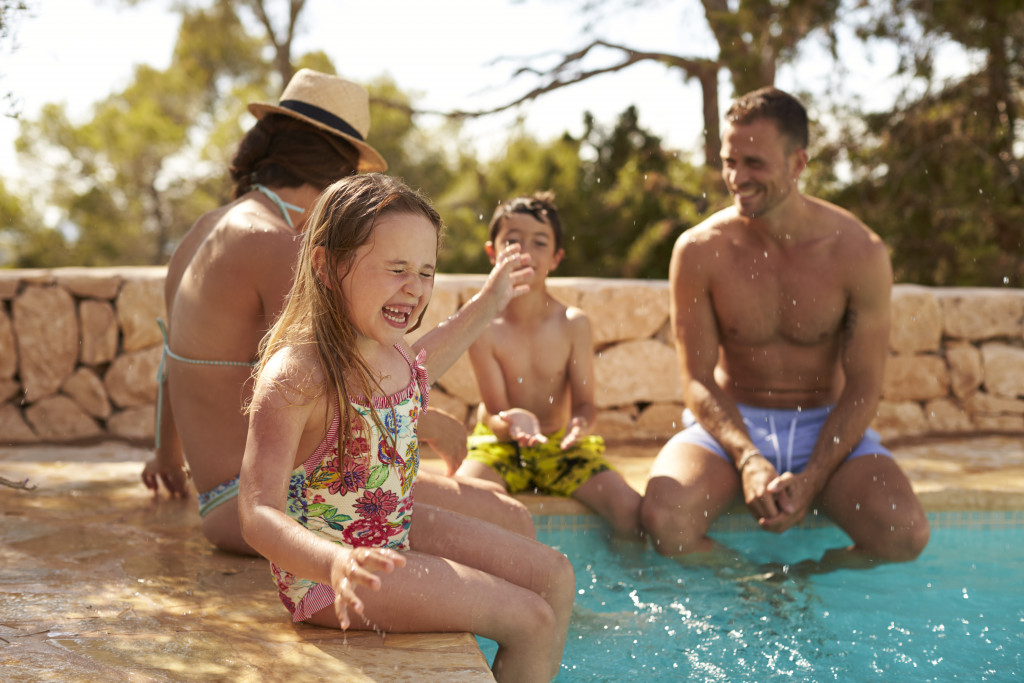 family by the pool