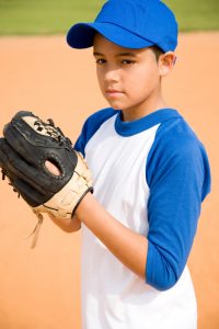 Kid preparing to throw pitch